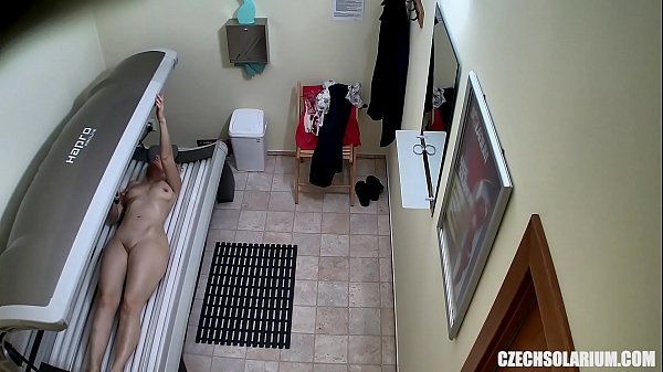 Older MILF Tanning her Hairless Taut Muff